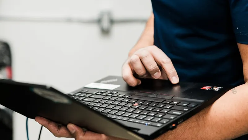 IT support professional helping with technology services